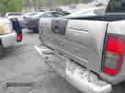 2001 Nissan Frontier SE Desert Runner z VIN 1N6ED26T91C346200, wystawiony jako IAAI lot #41914616 z przebiegiem 236 612 mil mil oraz . Historia ofert i sprzedaży dostępna na DreamBid. Obrazek 6.