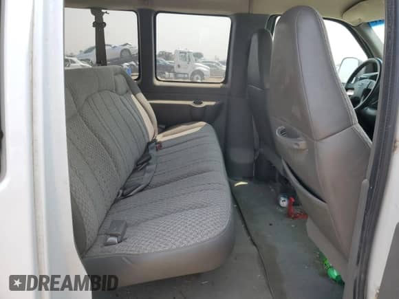 2004 Chevrolet Express Passenger z VIN 1GAHG39U541221463, wystawiony jako Copart lot #64142414 z przebiegiem 140 703 mil mil oraz Czysty tytuł • Clean title. Historia ofert i sprzedaży dostępna na DreamBid. Obrazek 11.