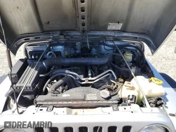 2006 Jeep Wrangler with VIN 1J4FA64S16P761717, listed as a Copart auction lot 82120065 with 118,677 mi miles and Non repairable. Bid and sale history available at DreamBid. Image 11.