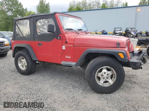 1998 Jeep Wrangler SE with VIN 1J4FY29P8WP767006, listed as a Copart auction lot 55603315 with 146,169 mi miles and Salvage title. Bid and sale history available at DreamBid. Image 4.