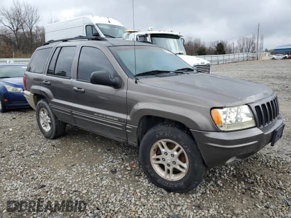 2000 Jeep Grand Cherokee Limited с VIN 1J4GW58S2YC336057, выставлен на аукционе Copart как лот 62738464 с пробегом 178 259 миль миль и Списание • Salvage title. История ставок и продаж доступна на DreamBid. Изображение 4.
