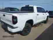 2020 Toyota Tundra SR5 z VIN 5TFDY5F11LX936048, wystawiony jako IAAI lot #42018523 z przebiegiem 102 445 mil mil oraz . Historia ofert i sprzedaży dostępna na DreamBid. Obrazek 4.
