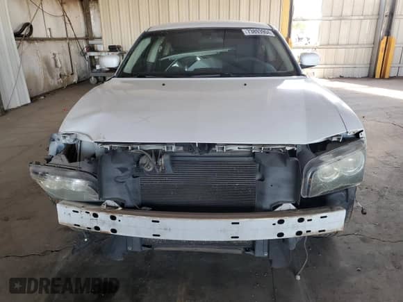 2010 Dodge Charger SXT with VIN 2B3CA3CV0AH290595, listed as a Copart auction lot 73893904 with 127,733 mi miles and Salvage title. Bid and sale history available at DreamBid. Image 5.