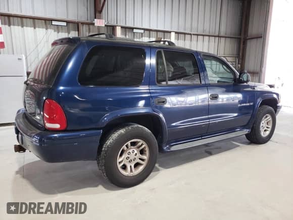 2001 Dodge Durango with VIN 1B4HS28N71F521236, listed as a Copart auction lot 56939715 with 199,223 mi miles and Clean title. Bid and sale history available at DreamBid. Image 3.