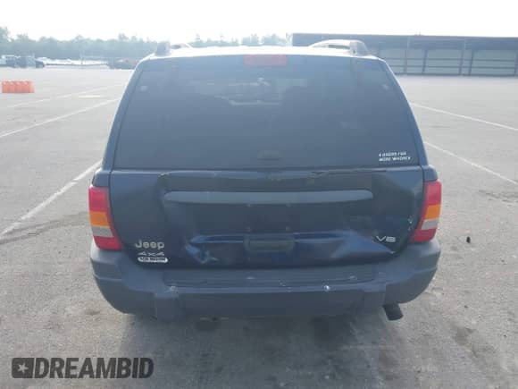 2004 Jeep Grand Cherokee Laredo with VIN 1J4GW48N34C357627, listed as a IAAI auction lot 42672019 with 249,510 mi miles and . Bid and sale history available at DreamBid. Image 16.