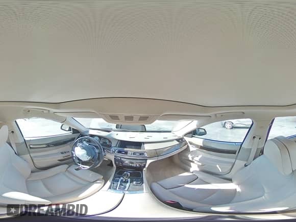 2013 BMW 7 Series 740Li xDrive с VIN WBAYF4C55DD127791, выставлен на аукционе Copart как лот 66229385 с пробегом 46 859 миль миль и Списание • Salvage title. История ставок и продаж доступна на DreamBid. Изображение 14.