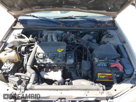 1997 Toyota Camry LE z VIN 4T1BF22K0VU029186, wystawiony jako IAAI lot #42029297 z przebiegiem 153 204 mil mil oraz . Historia ofert i sprzedaży dostępna na DreamBid. Obrazek 10.