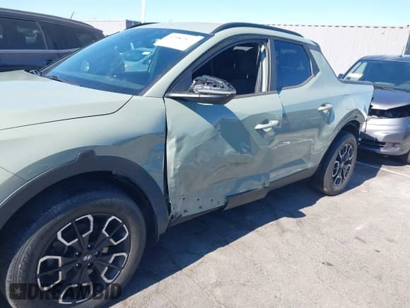 2022 Hyundai Santa Cruz SEL Premium с VIN 5NTJDDAF9NH005762, выставлен на аукционе IAAI как лот 42587584 с пробегом 35 779 миль миль и . История ставок и продаж доступна на DreamBid. Изображение 6.