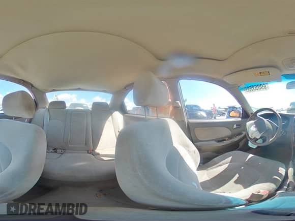 2001 Hyundai Sonata GLS z VIN KMHWF35V11A485934, wystawiony jako Copart lot #69853585 z przebiegiem 120 924 mil mil oraz Szkoda całkowita • Salvage title. Historia ofert i sprzedaży dostępna na DreamBid. Obrazek 15.