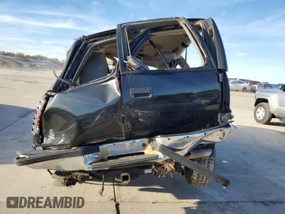 1995 Chevrolet Tahoe z VIN 3GNEK18K0SG103792, wystawiony jako Copart lot #80339604 z przebiegiem 356 496 mil mil oraz Szkoda całkowita • Salvage title. Historia ofert i sprzedaży dostępna na DreamBid. Obrazek 6.