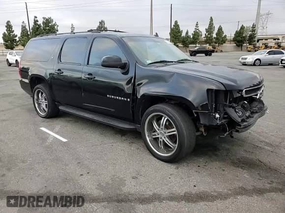 2009 Chevrolet Suburban 2LT с VIN 1GNFC26089R196628, выставлен на аукционе Copart как лот 80308515 с пробегом 279 976 миль миль и Списание • Salvage title. История ставок и продаж доступна на DreamBid. Изображение 15.