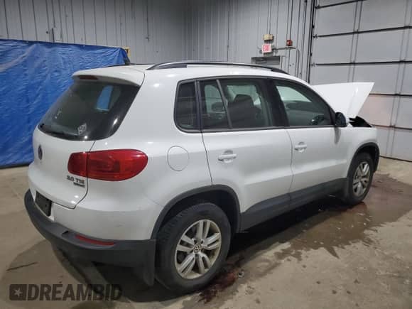 2015 Volkswagen Tiguan SEL with VIN WVGBV7AX5FW582595, listed as a Copart auction lot 68523275 with 128,991 mi miles and Salvage title. Bid and sale history available at DreamBid. Image 3.