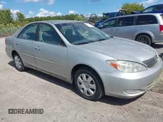 2003 Toyota Camry LE with VIN 4T1BE32K33U165706, listed as a IAAI auction lot 43134674 with 258,478 mi miles and . Bid and sale history available at DreamBid. Image 1.