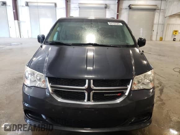 2014 Dodge Grand Caravan SXT with VIN 2C4RDGCG9ER203169, listed as a Copart auction lot 84742585 with 84,163 mi miles and Salvage title. Bid and sale history available at DreamBid. Image 5.