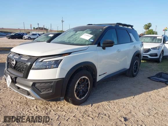 2023 Nissan Pathfinder Rock Creek with VIN 5N1DR3BD6PC254342, listed as a IAAI auction lot 41950069 with 26,144 mi miles and . Bid and sale history available at DreamBid. Image 2.