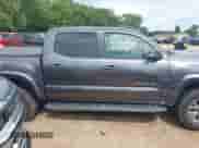 2018 Toyota Tacoma SR5 with VIN 5TFAZ5CN2JX061728, listed as a IAAI auction lot 42775812 with 119,408 mi miles and . Bid and sale history available at DreamBid. Image 13.