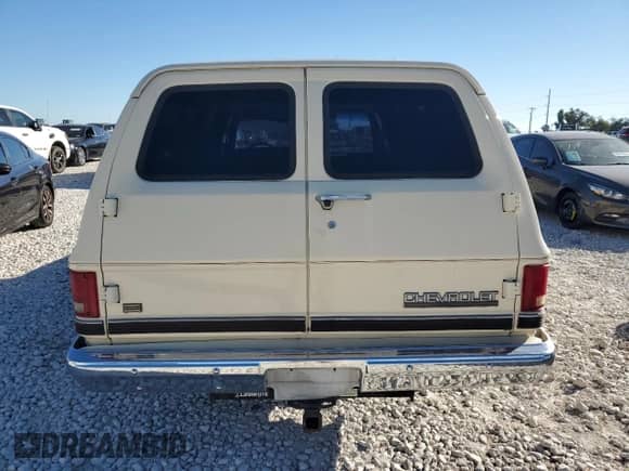 1990 Chevrolet Suburban с VIN 1GNER16K0LF169745, выставлен на аукционе Copart как лот 80865164 с пробегом 63 954 миль миль и Чистый • Clean title. История ставок и продаж доступна на DreamBid. Изображение 6.