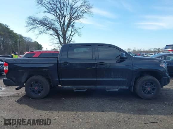 2021 Toyota Tundra SR5 with VIN 5TFDY5F10MX964425, listed as a IAAI auction lot 41843735 with 108,005 mi miles and . Bid and sale history available at DreamBid. Image 13.
