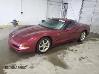 2003 Chevrolet Corvette with VIN 1G1YY22G235129021, listed as a Copart auction lot 85600875 with 73,384 mi miles and Salvage title. Bid and sale history available at DreamBid. Image 1.