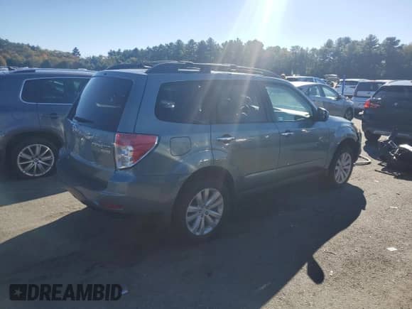 2012 Subaru Forester X Premium z VIN JF2SHADC6CH419568, wystawiony jako Copart lot #86185215 z przebiegiem 211 481 mil mil oraz Czysty tytuł • Clean title. Historia ofert i sprzedaży dostępna na DreamBid. Obrazek 3.