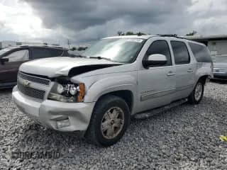2011 Chevrolet Suburban LT с VIN 1GNSCJE0XBR166076, выставлен на аукционе Copart как лот 85882165 с пробегом 169 114 миль миль и Списание • Salvage title. История ставок и продаж доступна на DreamBid. Изображение 1.