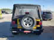 2000 Jeep Wrangler SE with VIN 1J4FA29P3YP705536, listed as a Copart auction lot 70344835 with 97,028 mi miles and Clean title. Bid and sale history available at DreamBid. Image 6.