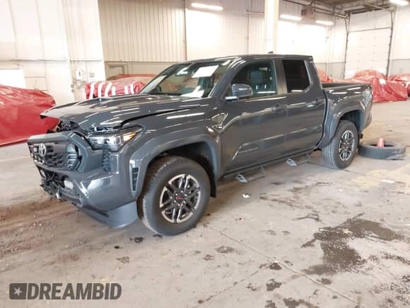 2024 Toyota Tacoma SR5 with VIN 3TMLB5JN9RM067351, listed as a IAAI auction lot 41529043 with 3,054 mi miles and . Bid and sale history available at DreamBid. Image 2.