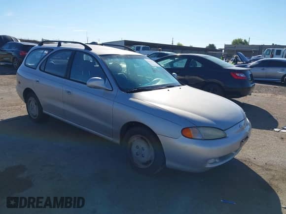 1998 Hyundai Elantra with VIN KMHJW34M6WU114857, listed as a IAAI auction lot 43441622 with 163,604 mi miles and . Bid and sale history available at DreamBid. Image 1.
