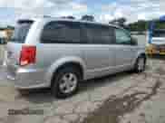 2011 Dodge Grand Caravan Mainstreet with VIN 2D4RN3DG3BR732832, listed as a Copart auction lot 62834335 with 172,565 mi miles and Salvage title. Bid and sale history available at DreamBid. Image 3.