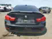 2015 BMW 4 Series 428i xDrive z VIN WBA3N9C58FK246525, wystawiony jako Copart lot #55298895 z przebiegiem 126 990 mil mil oraz Szkoda całkowita • Salvage title. Historia ofert i sprzedaży dostępna na DreamBid. Obrazek 6.
