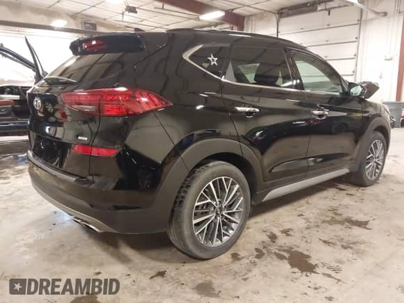 2021 Hyundai Tucson Limited with VIN KM8J3CAL6MU385001, listed as a IAAI auction lot 42230850 with 30,439 mi miles and . Bid and sale history available at DreamBid. Image 4.