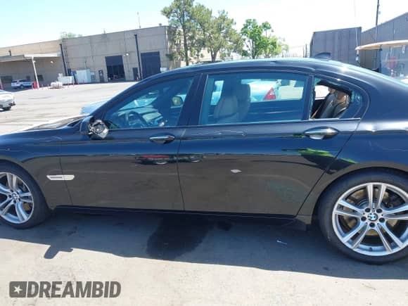 2011 BMW 7 Series 750Li with VIN WBAKB8C5XBCY64531, listed as a IAAI auction lot 42350009 with 113,893 mi miles and . Bid and sale history available at DreamBid. Image 14.