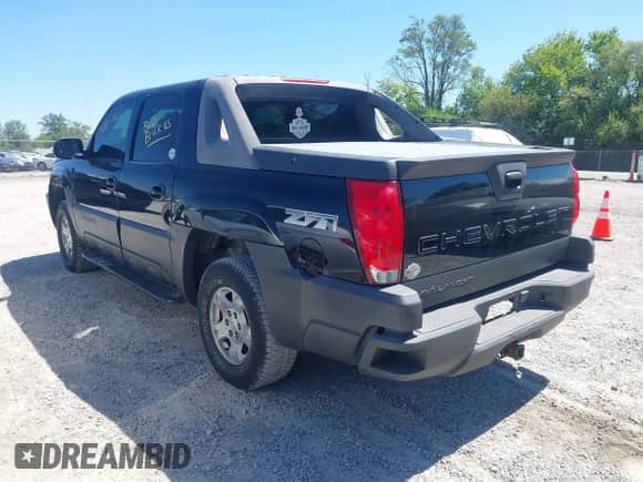 2003 Chevrolet Avalanche with VIN 3GNEK13TX3G139748, listed as a IAAI auction lot 43043211 with 141,073 mi miles and . Bid and sale history available at DreamBid. Image 3.