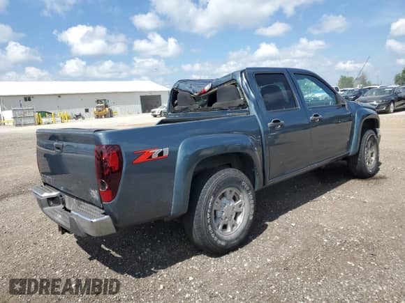 2007 Chevrolet Colorado 2LT with VIN 1GCDS13E878222340, listed as a Copart auction lot 64775035 with 201,802 mi miles and Salvage title. Bid and sale history available at DreamBid. Image 3.