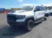 2021 Ram 1500 TRX with VIN 1C6SRFU9XMN905260, listed as a IAAI auction lot 41745910 with 69,565 mi miles and . Bid and sale history available at DreamBid. Image 2.