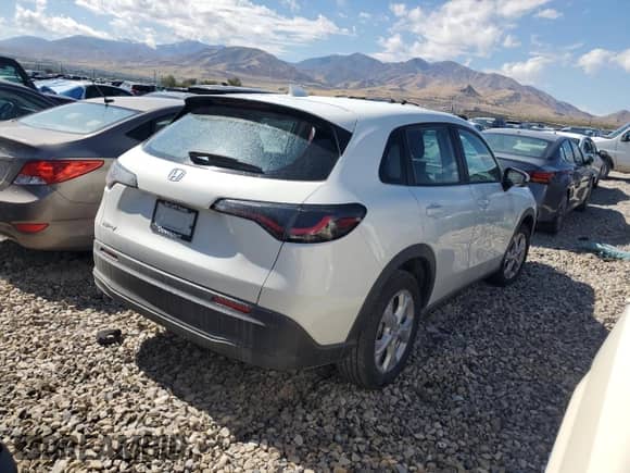 2023 Honda HR-V LX z VIN 3CZRZ2H37PM740430, wystawiony jako Copart lot #68395635 z przebiegiem 91 723 mil mil oraz Szkoda całkowita • Salvage title. Historia ofert i sprzedaży dostępna na DreamBid. Obrazek 3.