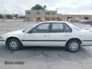 1990 Honda Accord LX with VIN JHMCB7652LC067333, listed as a IAAI auction lot 42580921 with 119,733 mi miles and . Bid and sale history available at DreamBid. Image 14.