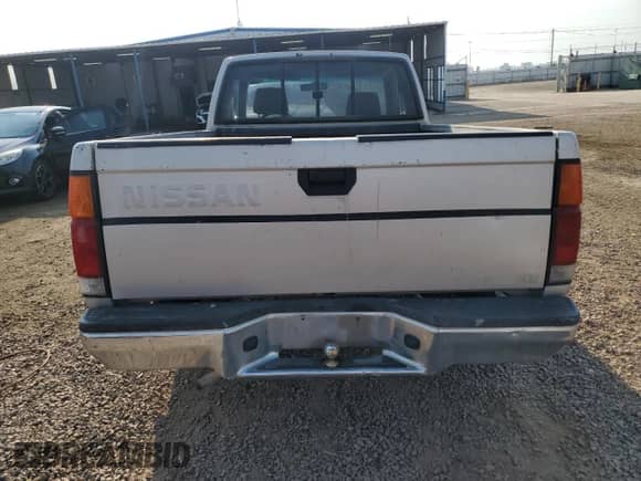 1996 Nissan Frontier XE z VIN 1N6SD16S8TC351606, wystawiony jako Copart lot #67078455 z przebiegiem 257 988 mil mil oraz Szkoda całkowita • Salvage title. Historia ofert i sprzedaży dostępna na DreamBid. Obrazek 6.