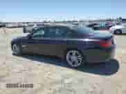2014 BMW 7 Series 740Li with VIN WBAYE4C58ED137901, listed as a Copart auction lot 61493495 with 206,313 mi miles and Salvage title. Bid and sale history available at DreamBid. Image 2.
