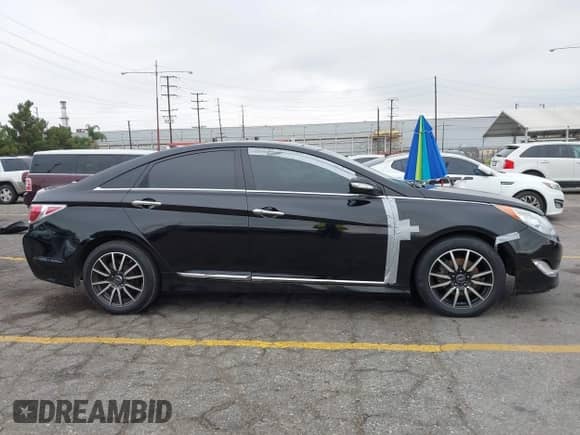 2015 Hyundai Sonata z VIN KMHEC4A4XFA131067, wystawiony jako IAAI lot #43348137 z przebiegiem 148 103 mil mil oraz . Historia ofert i sprzedaży dostępna na DreamBid. Obrazek 13.