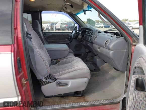 1998 Dodge 1500 z VIN 1B7HF13Y5WJ180264, wystawiony jako IAAI lot #41858346 z przebiegiem 117 340 mil mil oraz . Historia ofert i sprzedaży dostępna na DreamBid. Obrazek 5.