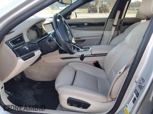 2015 BMW 7 Series 750i with VIN WBAYA8C53FGK19778, listed as a Copart auction lot 77258684 with 34,535 mi miles and Salvage title. Bid and sale history available at DreamBid. Image 7.