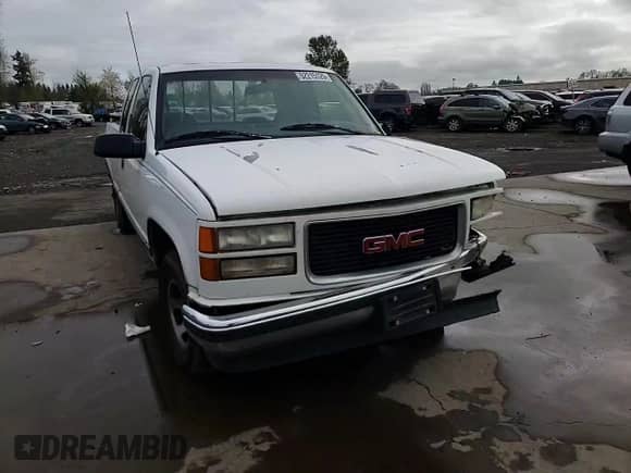 1997 GMC Sierra 1500 z VIN 2GTEC19R8V1523041, wystawiony jako Copart lot #52215125 z przebiegiem 207 461 mil mil oraz Szkoda całkowita • Salvage title. Historia ofert i sprzedaży dostępna na DreamBid. Obrazek 11.