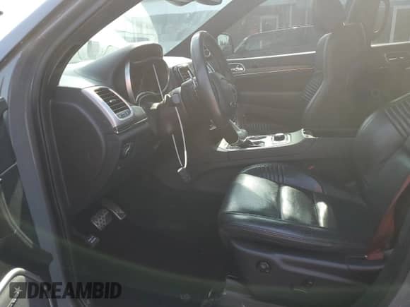 2020 Jeep Grand Cherokee SRT with VIN 1C4RJFDJ8LC158048, listed as a Copart auction lot 57426205 with 52,979 mi miles and Salvage title. Bid and sale history available at DreamBid. Image 7.