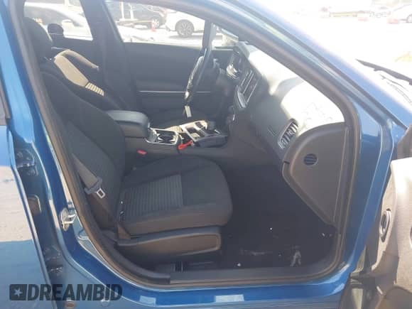 2023 Dodge Charger SXT with VIN 2C3CDXBG7PH660986, listed as a IAAI auction lot 43233732 with 23,404 mi miles and . Bid and sale history available at DreamBid. Image 5.