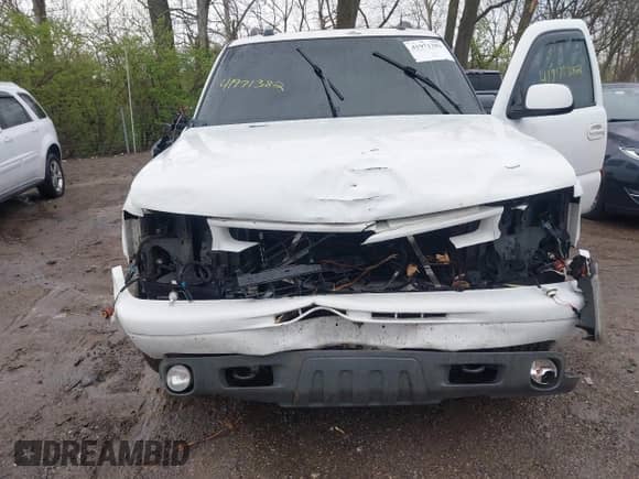 2005 Chevrolet Suburban Z71 z VIN 3GNFK16Z45G127697, wystawiony jako IAAI lot #41971382 z przebiegiem 270 655 mil mil oraz . Historia ofert i sprzedaży dostępna na DreamBid. Obrazek 6.