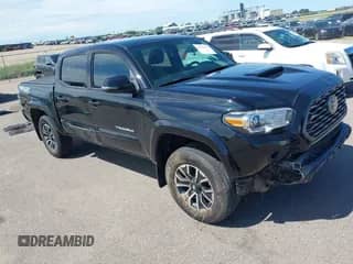 2021 Toyota Tacoma SR with VIN 5TFCZ5AN5MX277623, listed as a IAAI auction lot 42620337 with 65,916 mi miles and . Bid and sale history available at DreamBid. Image 1.
