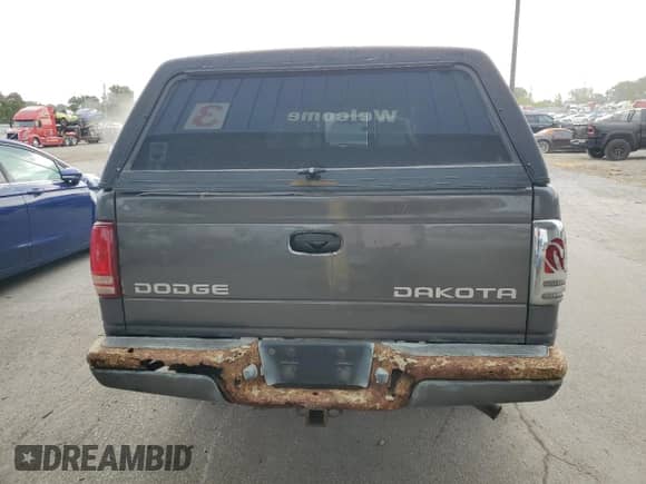 2004 Dodge Dakota with VIN 1D7HG32K24S651547, listed as a Copart auction lot 80031045 with 157,257 mi miles and Salvage title. Bid and sale history available at DreamBid. Image 6.