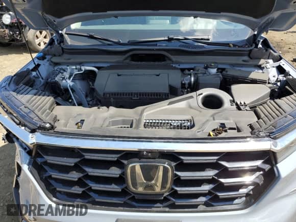 2023 Honda Pilot Elite with VIN 5FNYG1H82PB034130, listed as a Copart auction lot 56763214 with 7,710 mi miles and Salvage title. Bid and sale history available at DreamBid. Image 12.