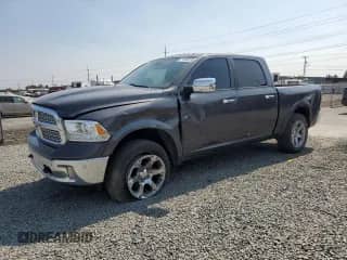 2017 Ram 1500 Laramie с VIN 1C6RR7NT1HS854673, выставлен на аукционе Copart как лот 71326135 с пробегом 65 403 миль миль и Списание • Salvage title. История ставок и продаж доступна на DreamBid. Изображение 1.